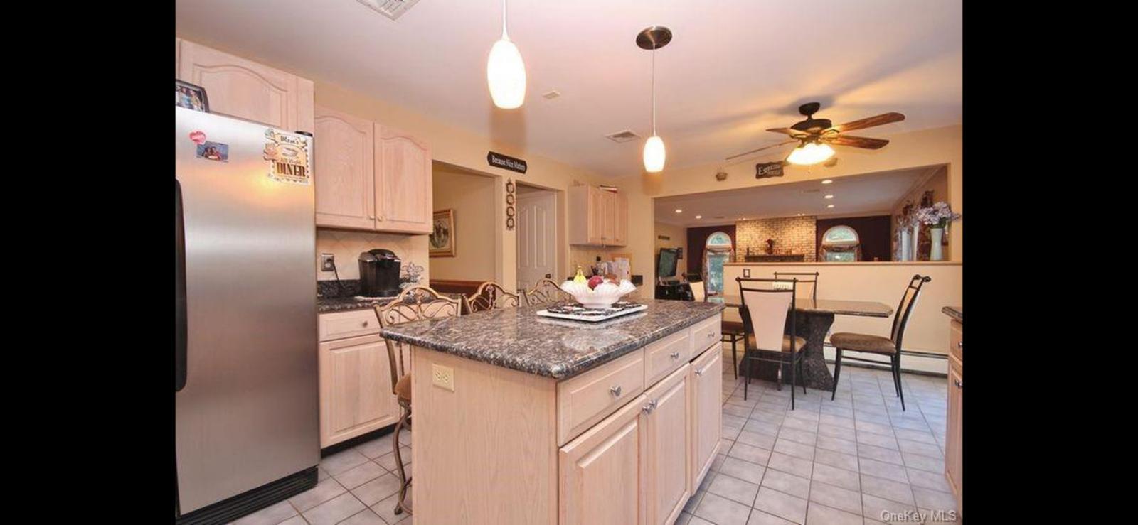 15 Ryder Court Stony Point, NY 10980 - Photo 15 of 31 a kitchen with cabinets and chairs