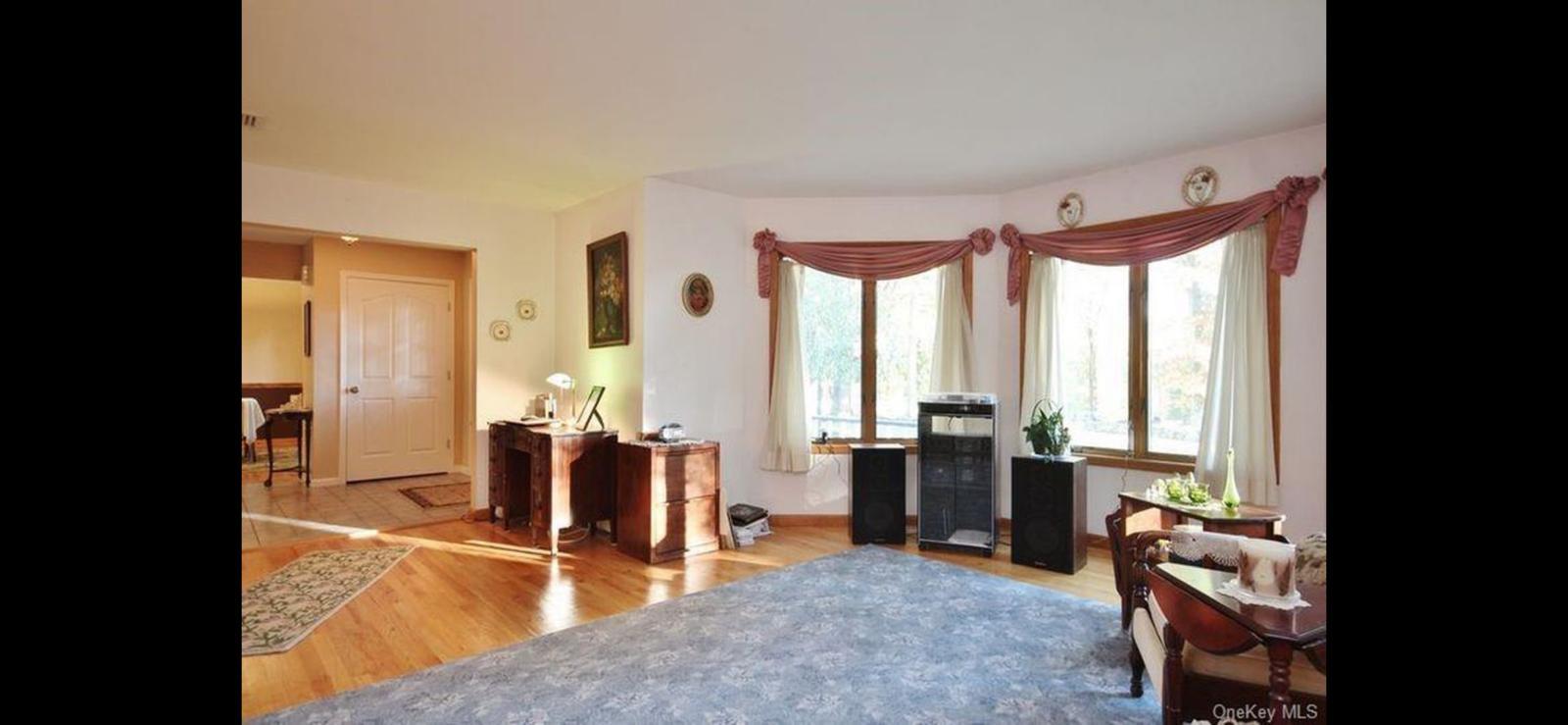 15 Ryder Court Stony Point, NY 10980 - Photo 6 of 31 a living room with furniture and large windows