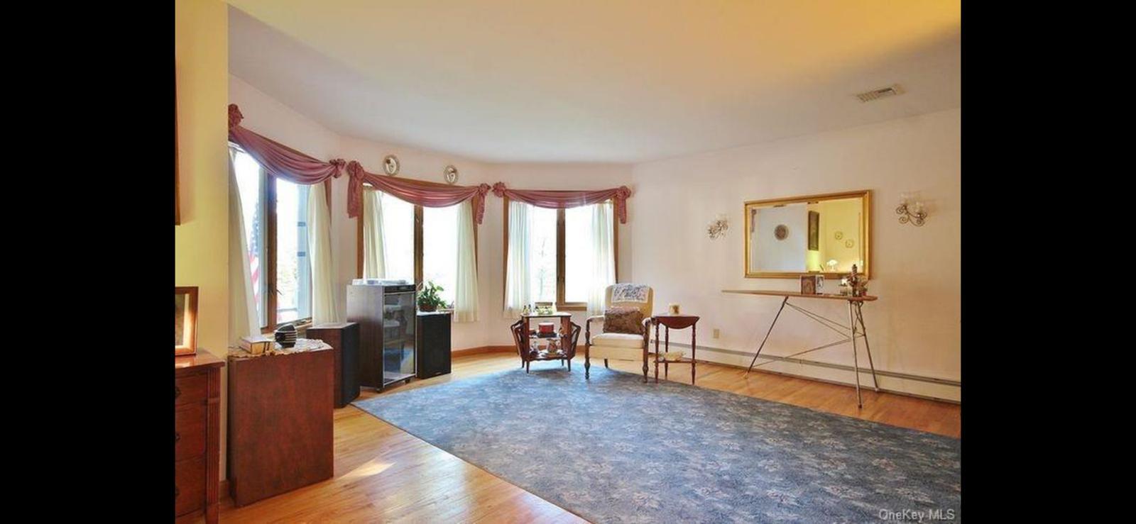 15 Ryder Court Stony Point, NY 10980 - Photo 7 of 31 a living room with furniture and large windows