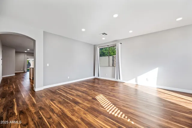 a view of a livingroom with wooden floor