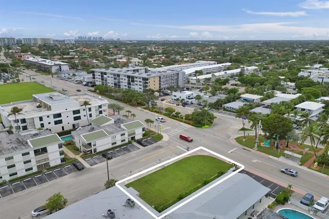 an aerial view of a city with lots of residential buildings