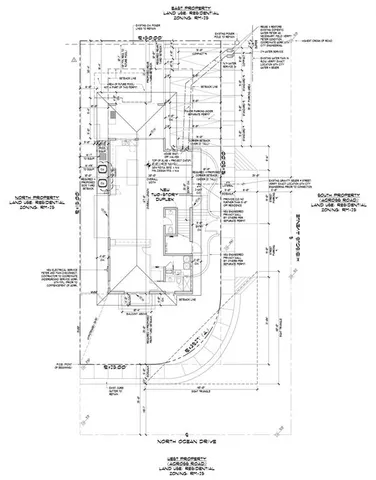 a black and white photo of a living room