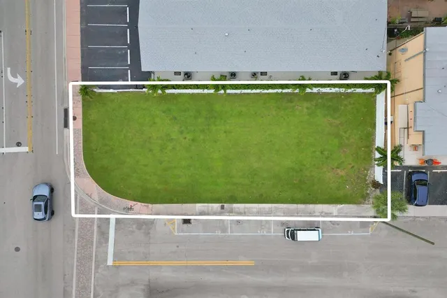 view of a room with a sink and mirror