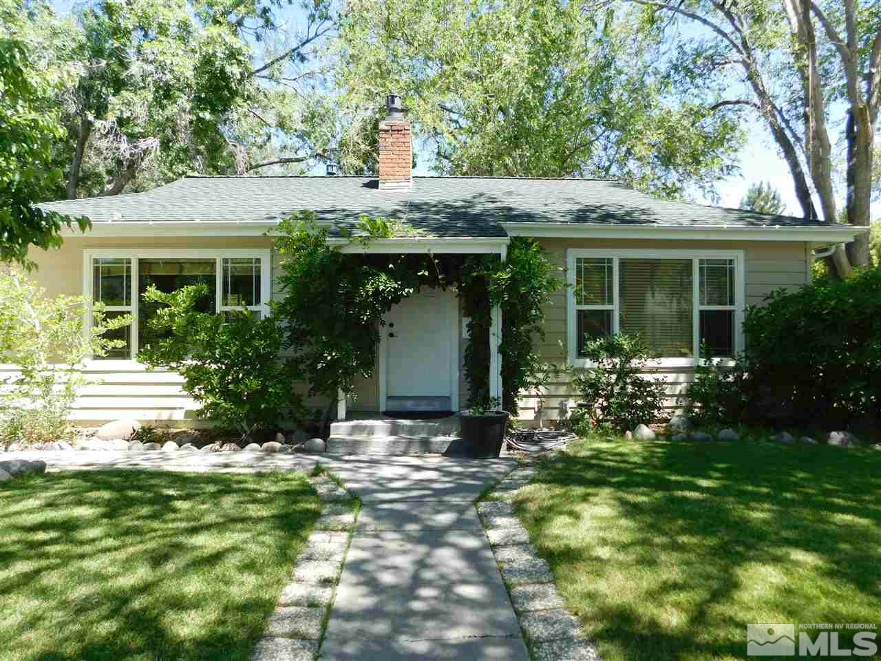 a view of a house with garden