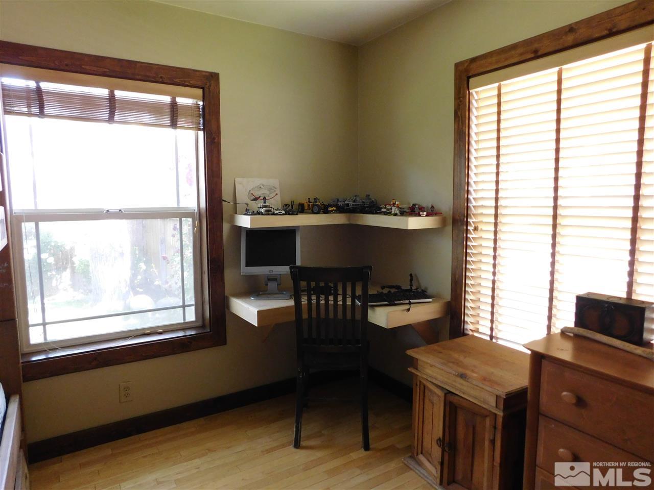 2001 Vale Street Reno, NV 89509 - Photo 12 of 16 a kitchen with a table chairs and a window