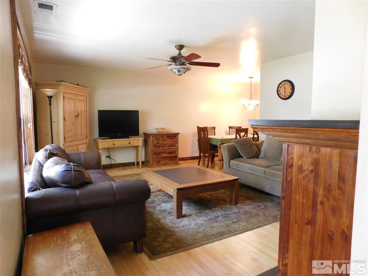 2001 Vale Street Reno, NV 89509 - Photo 3 of 16 a living room with furniture and a flat screen tv