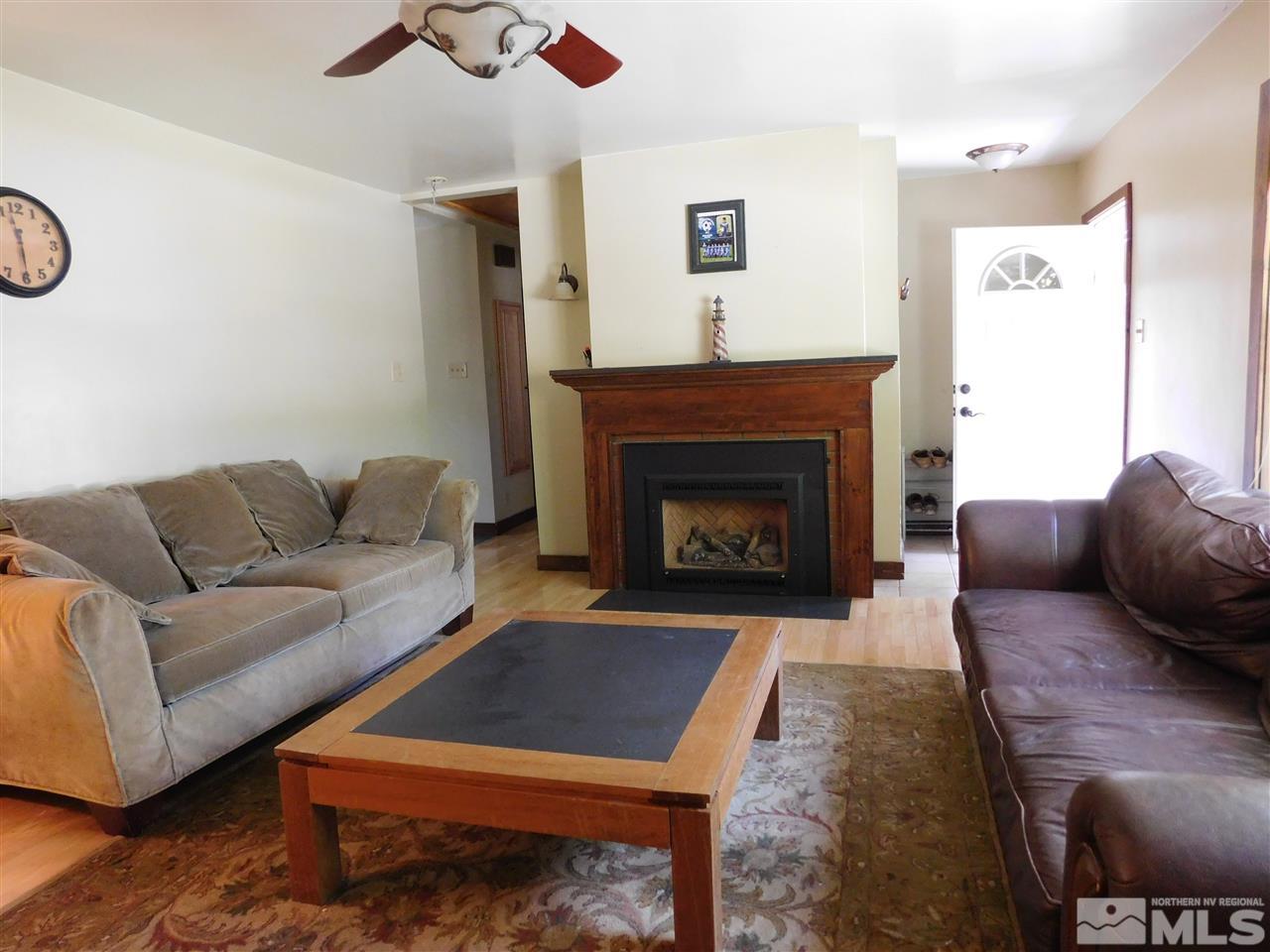 2001 Vale Street Reno, NV 89509 - Photo 4 of 16 a living room with furniture and a fireplace