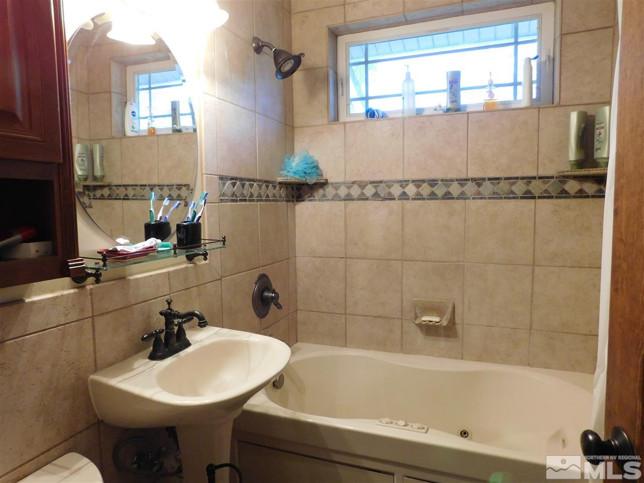 2001 Vale Street Reno, NV 89509 - Photo 8 of 16 a bathroom with a sink and a bathtub