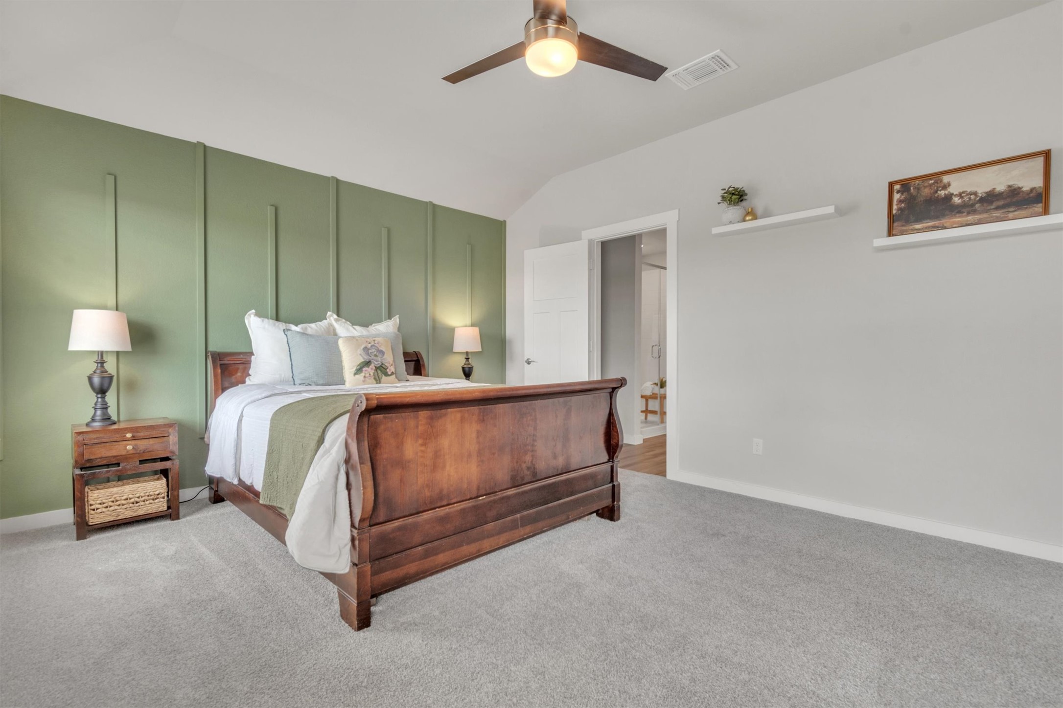 1008 Tipton Street Georgetown, TX 78633 - Photo 14 of 39 a bedroom with a bed and a lamp