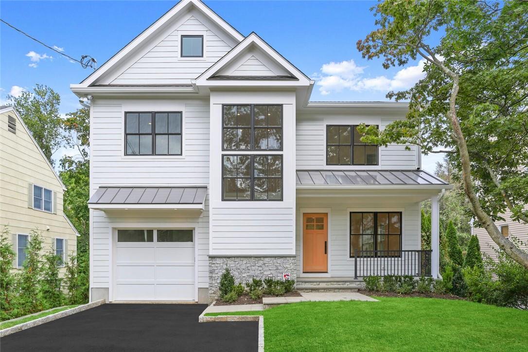 49 Fayette Road Scarsdale, NY 10583 - Photo 1 of 1 front view of a house with a yard