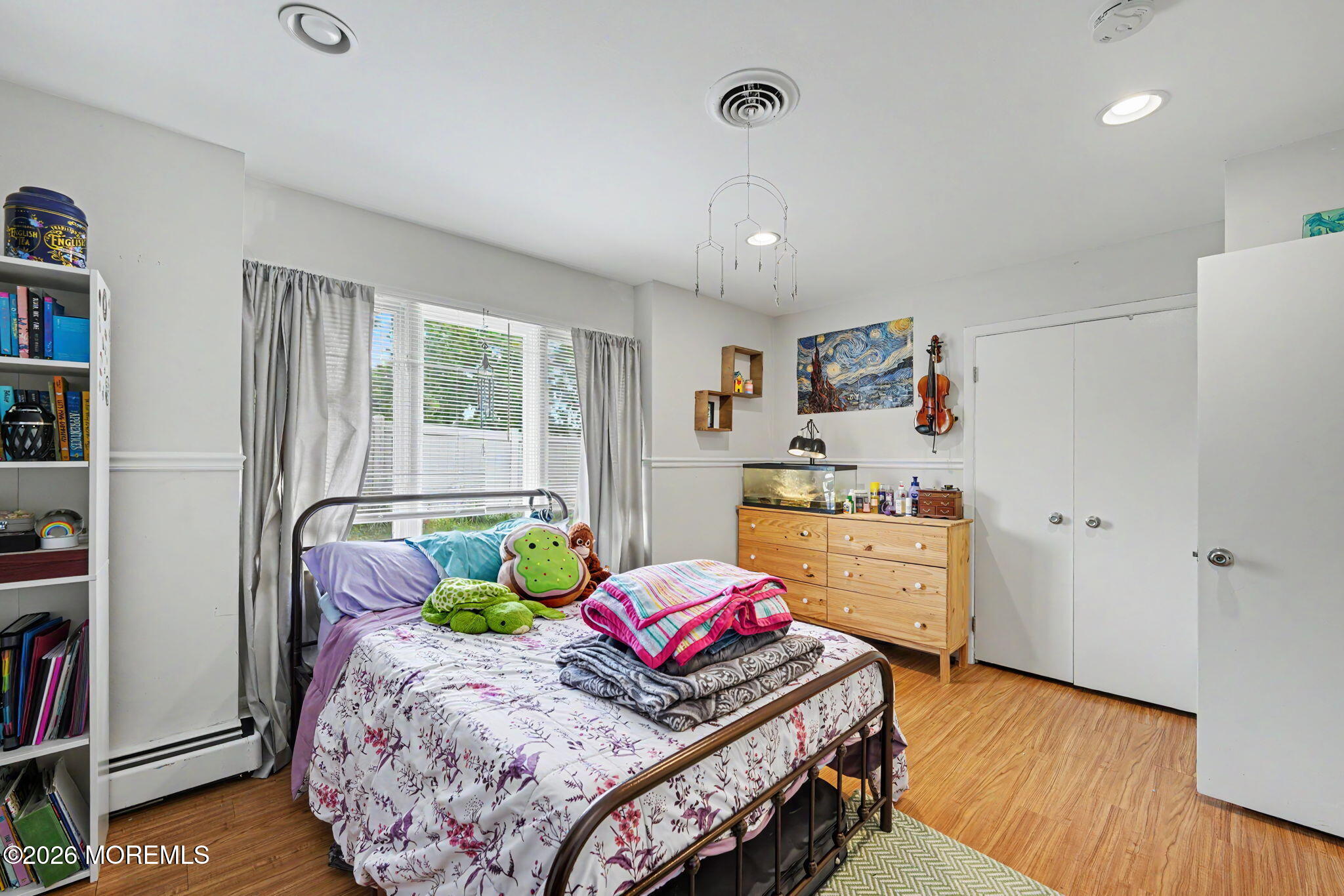 699 Aldrich Road Howell, NJ 07731 - Photo 16 of 30 a bedroom with furniture and a wooden floor