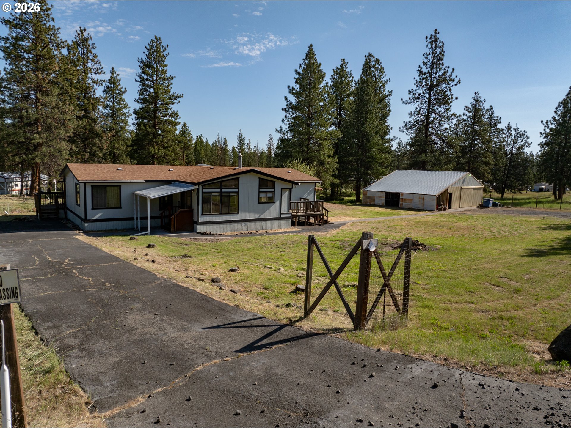 245 South Mike Road Tygh Valley, OR 97063 - Photo 1 of 22 a view of a house with backyard