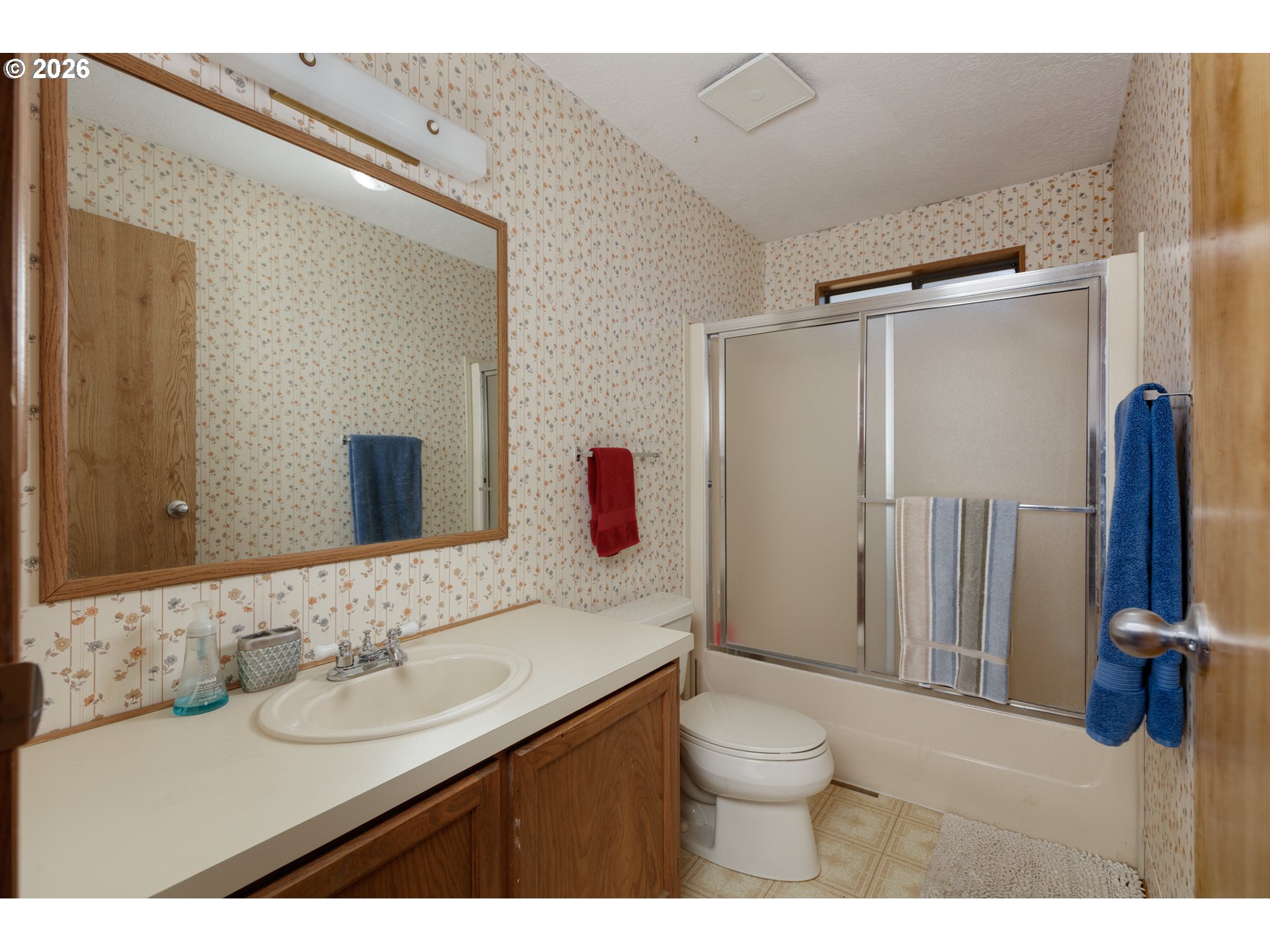 245 South Mike Road Tygh Valley, OR 97063 - Photo 13 of 22 a bathroom with a sink vanity granite and a toilet