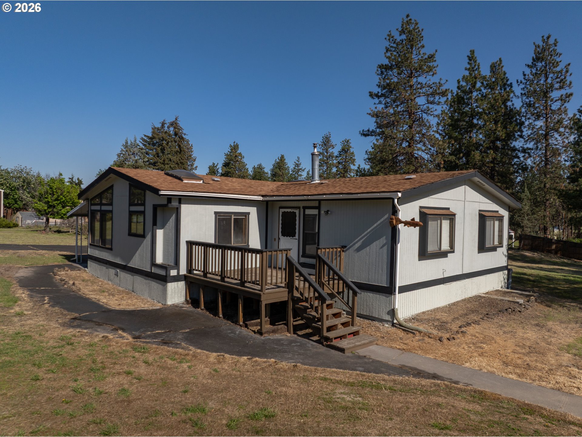 245 South Mike Road Tygh Valley, OR 97063 - Photo 3 of 22 a view of a house with a yard