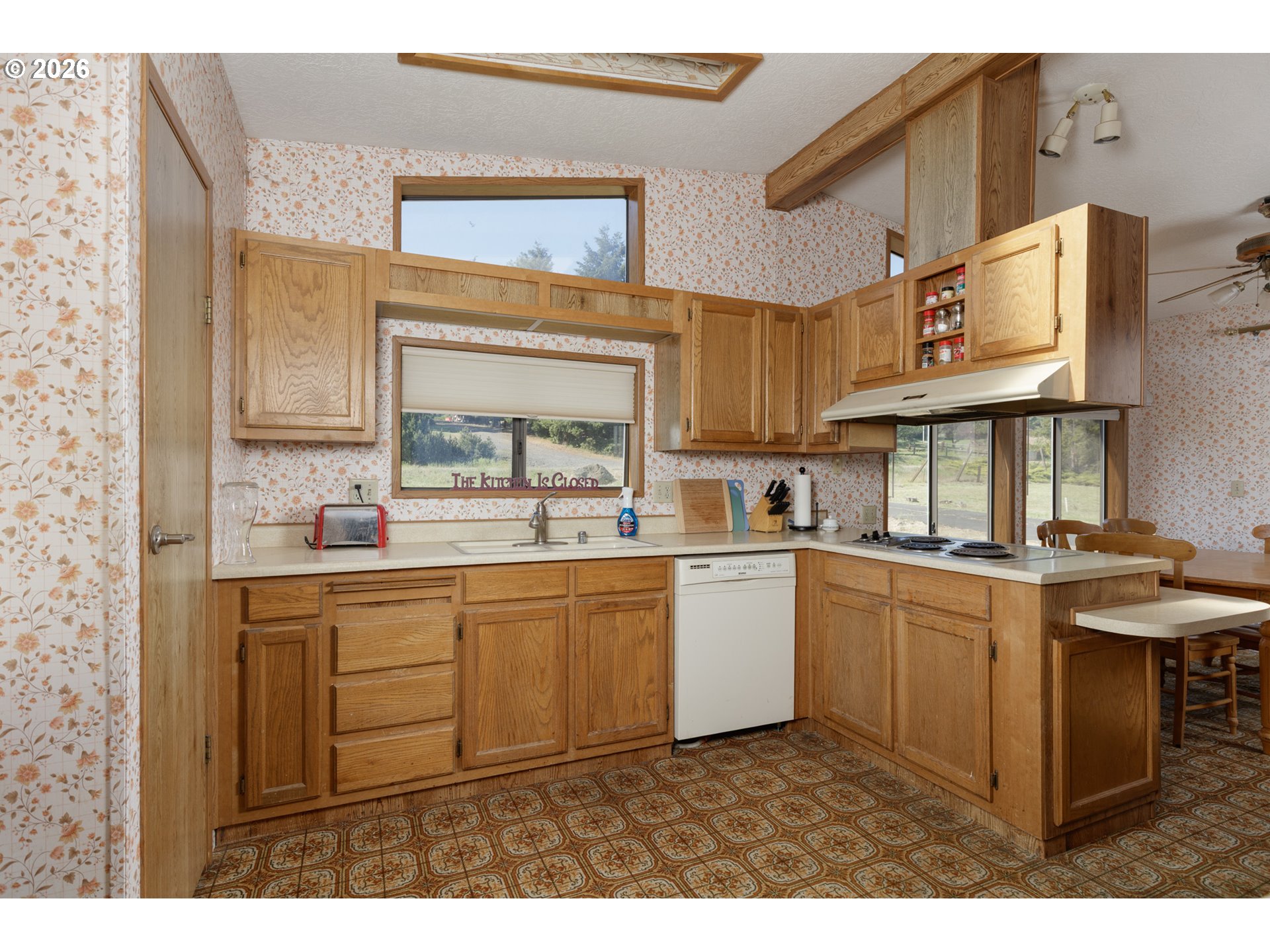 245 South Mike Road Tygh Valley, OR 97063 - Photo 8 of 22 a kitchen with cabinets and window
