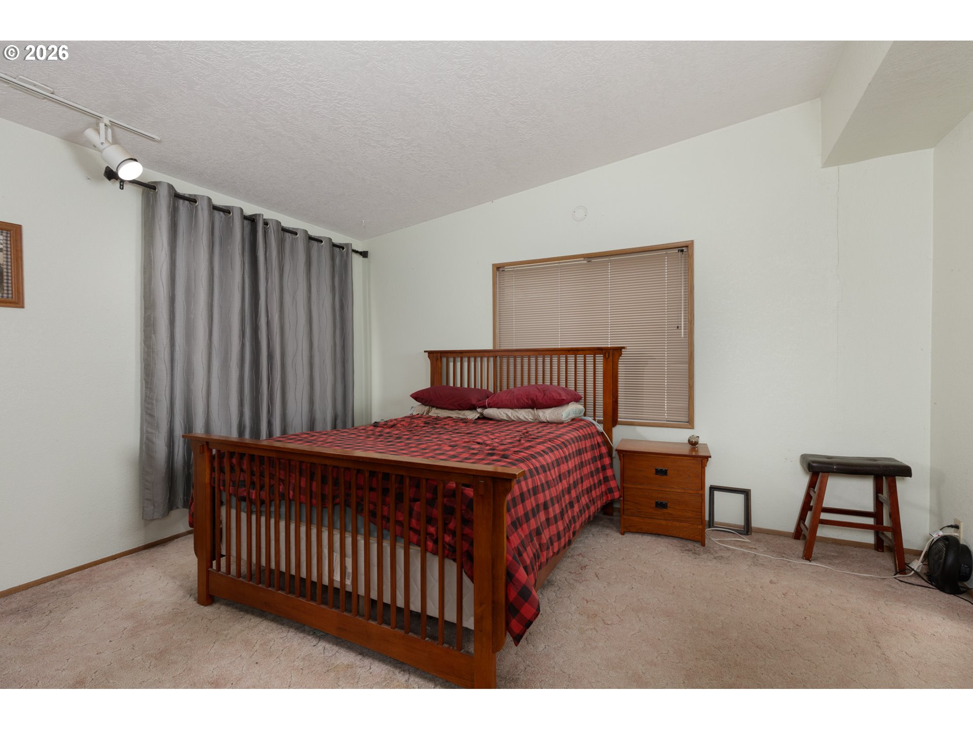 245 South Mike Road Tygh Valley, OR 97063 - Photo 9 of 22 a bedroom with a bed and a window