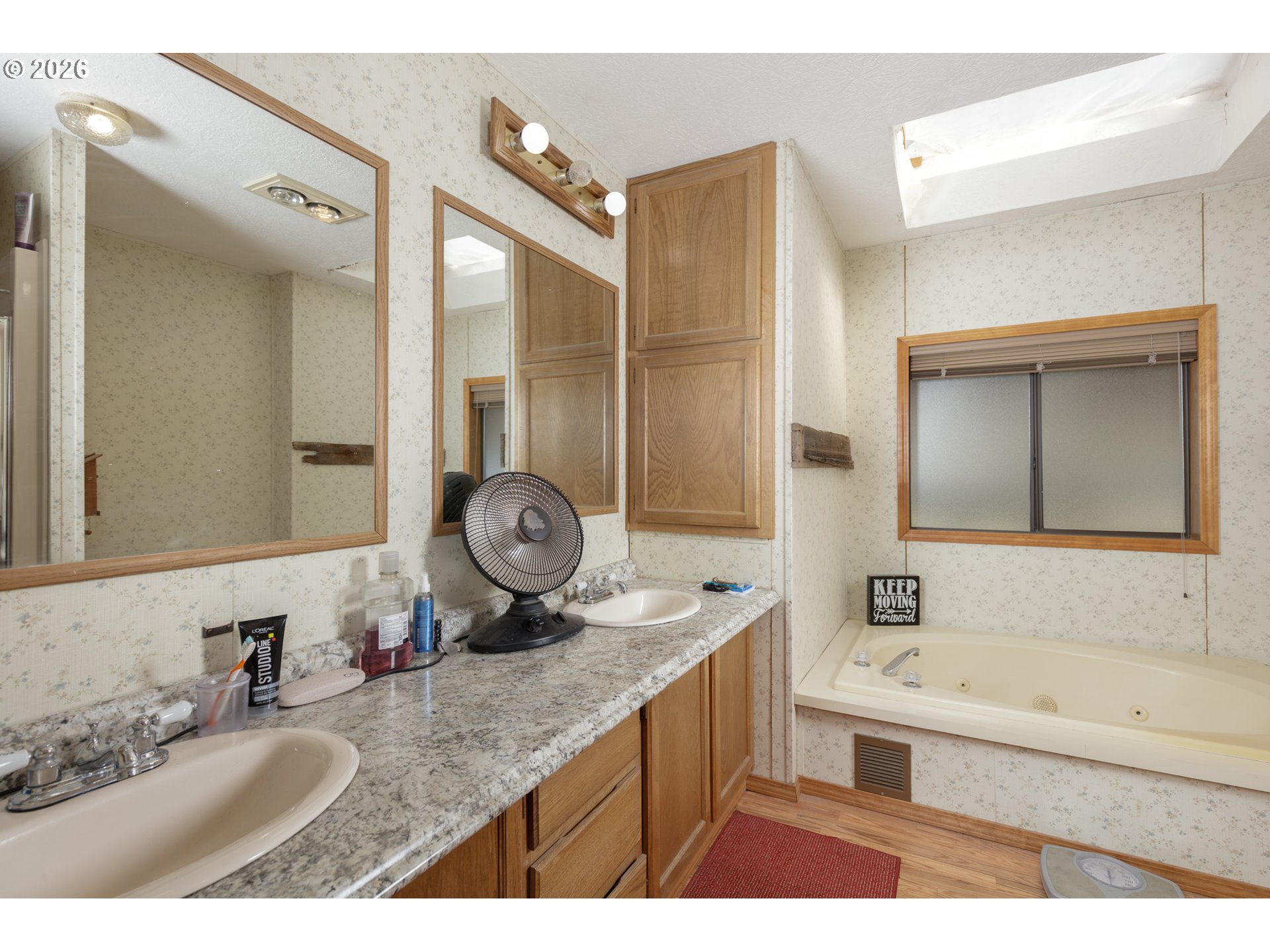 245 South Mike Road Tygh Valley, OR 97063 - Photo 10 of 22 a bathroom with a granite countertop sink mirror and bathtub