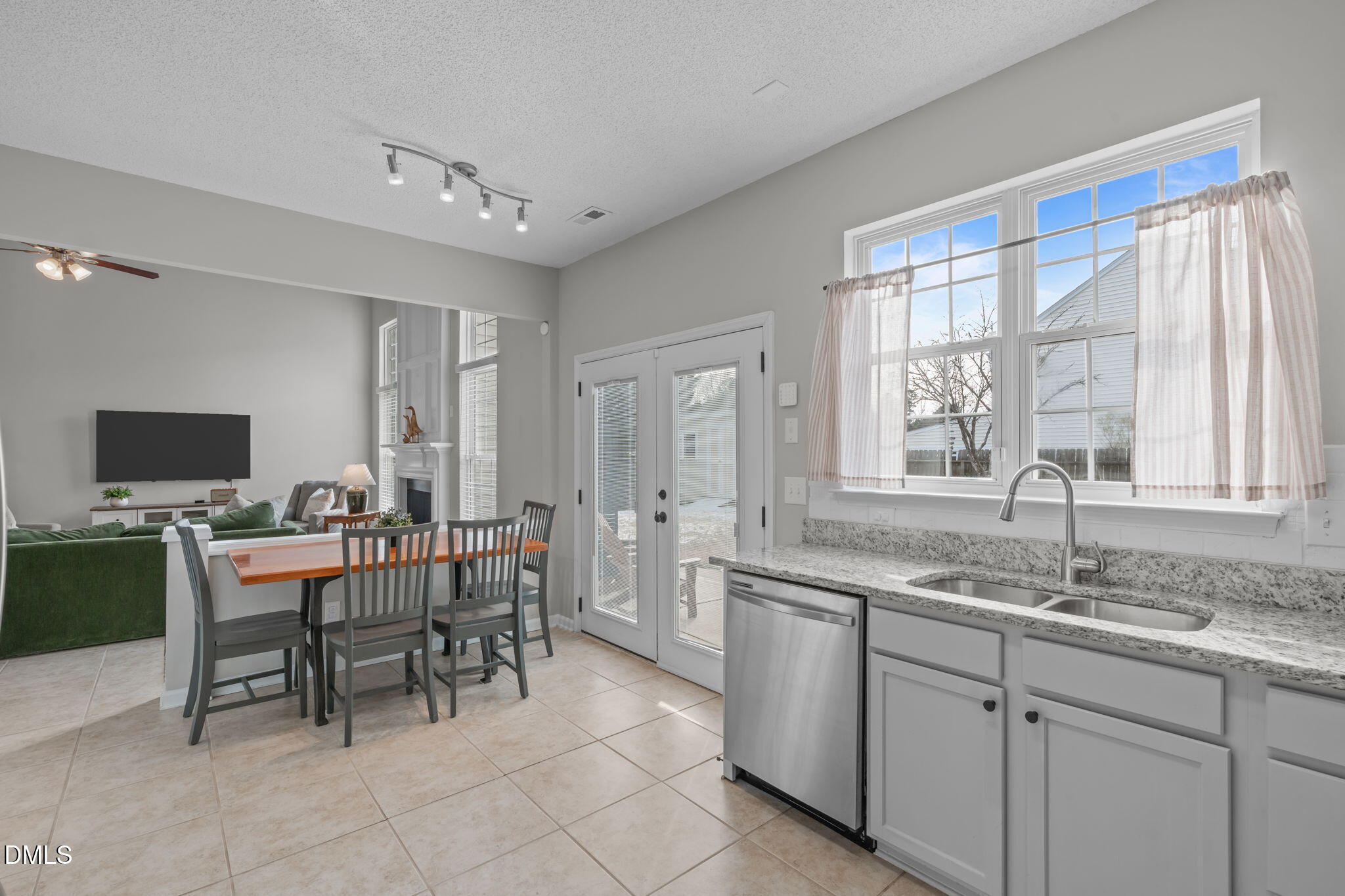 400 New Timber Path Apex, NC 27502 - Photo 10 of 34 a view of a dining room with furniture and a window