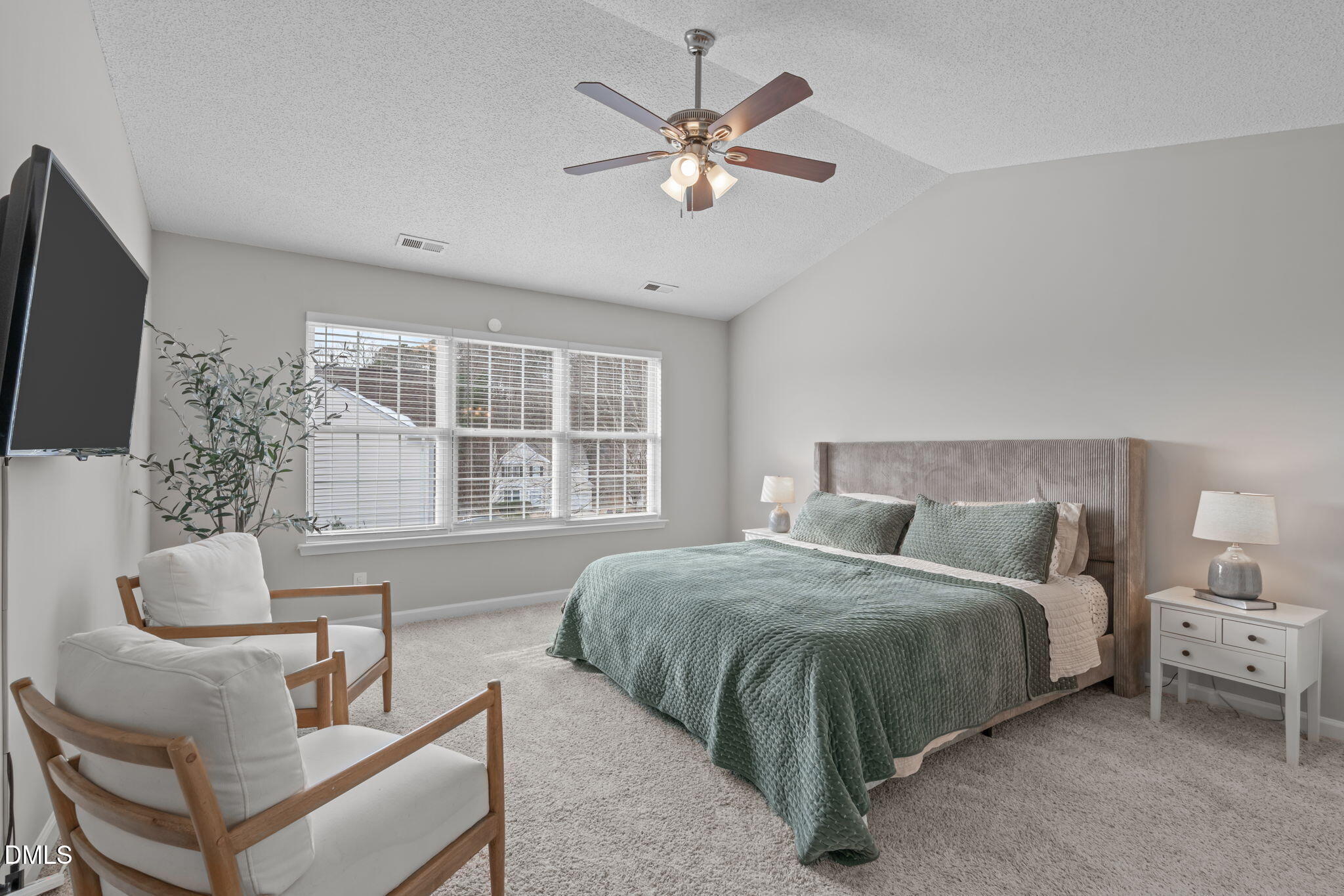 400 New Timber Path Apex, NC 27502 - Photo 16 of 34 a bedroom with bed and a large window