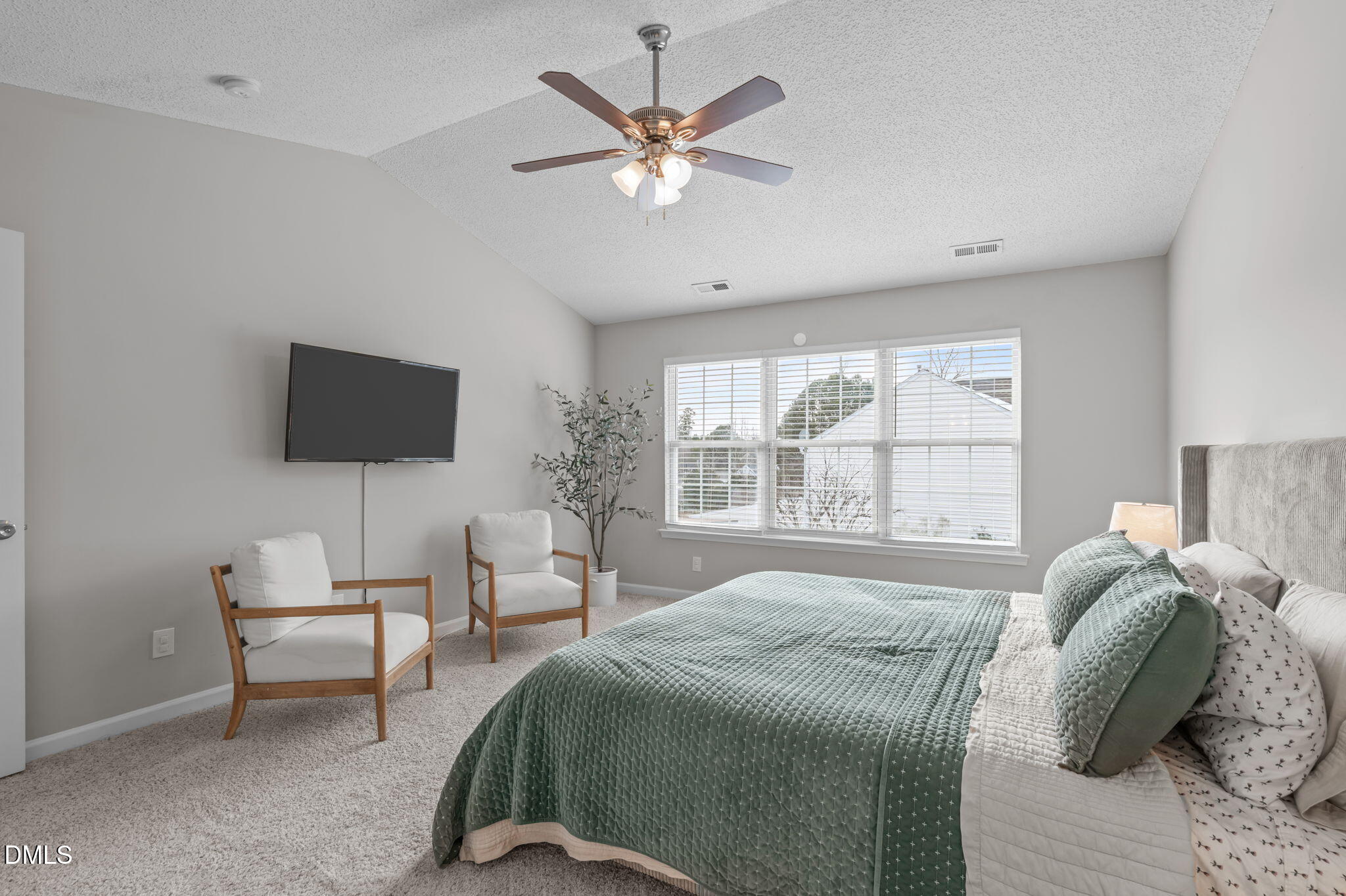 400 New Timber Path Apex, NC 27502 - Photo 18 of 34 a bedroom with a bed window and flat screen tv