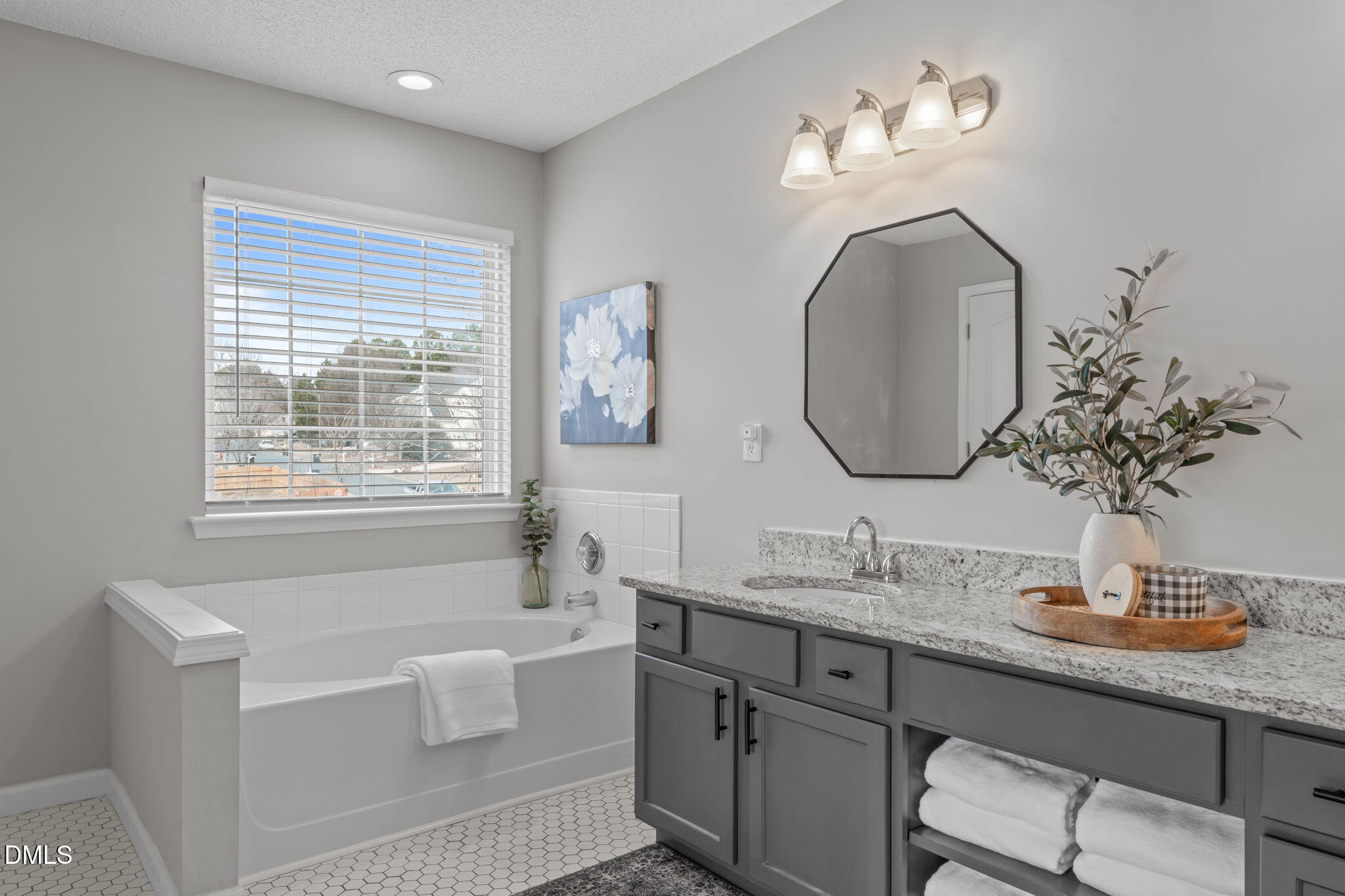 400 New Timber Path Apex, NC 27502 - Photo 21 of 34 a bathroom with a granite countertop double vanity sink and a mirror