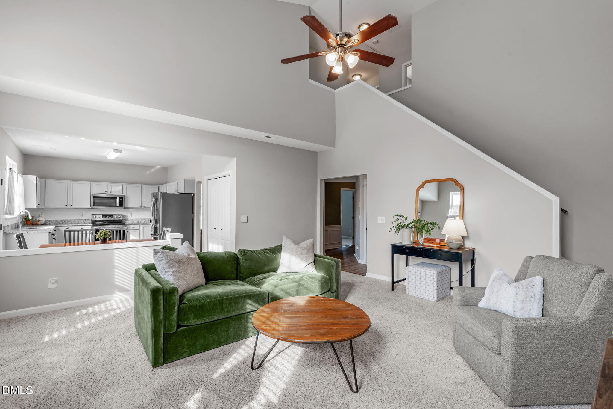 400 New Timber Path Apex, NC 27502 - Photo 6 of 34 a living room with furniture and a chandelier