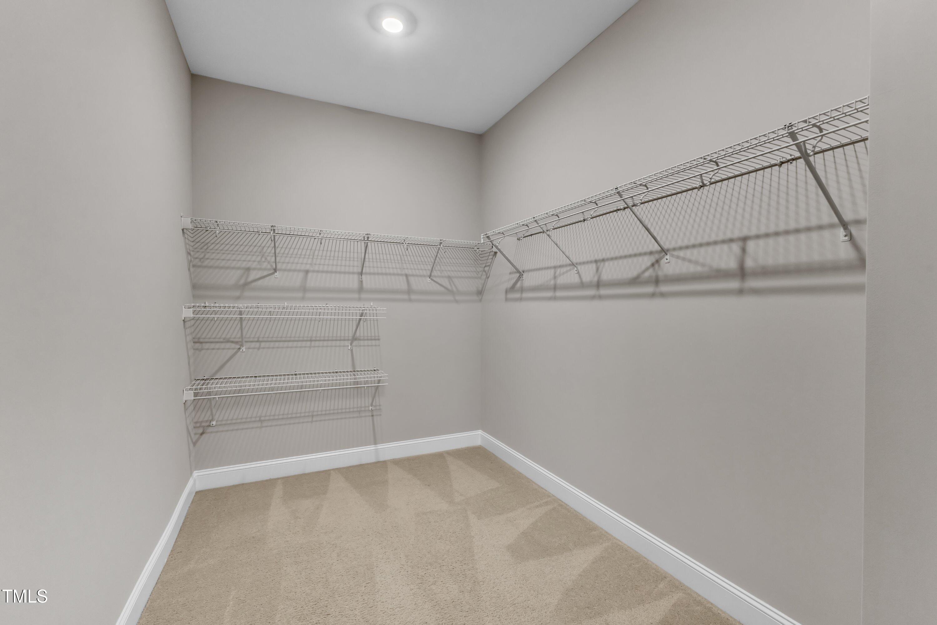 4252 Rockdell Hall Street Raleigh, NC 27616 - Photo 50 of 64 a view of a room with racks on the wall