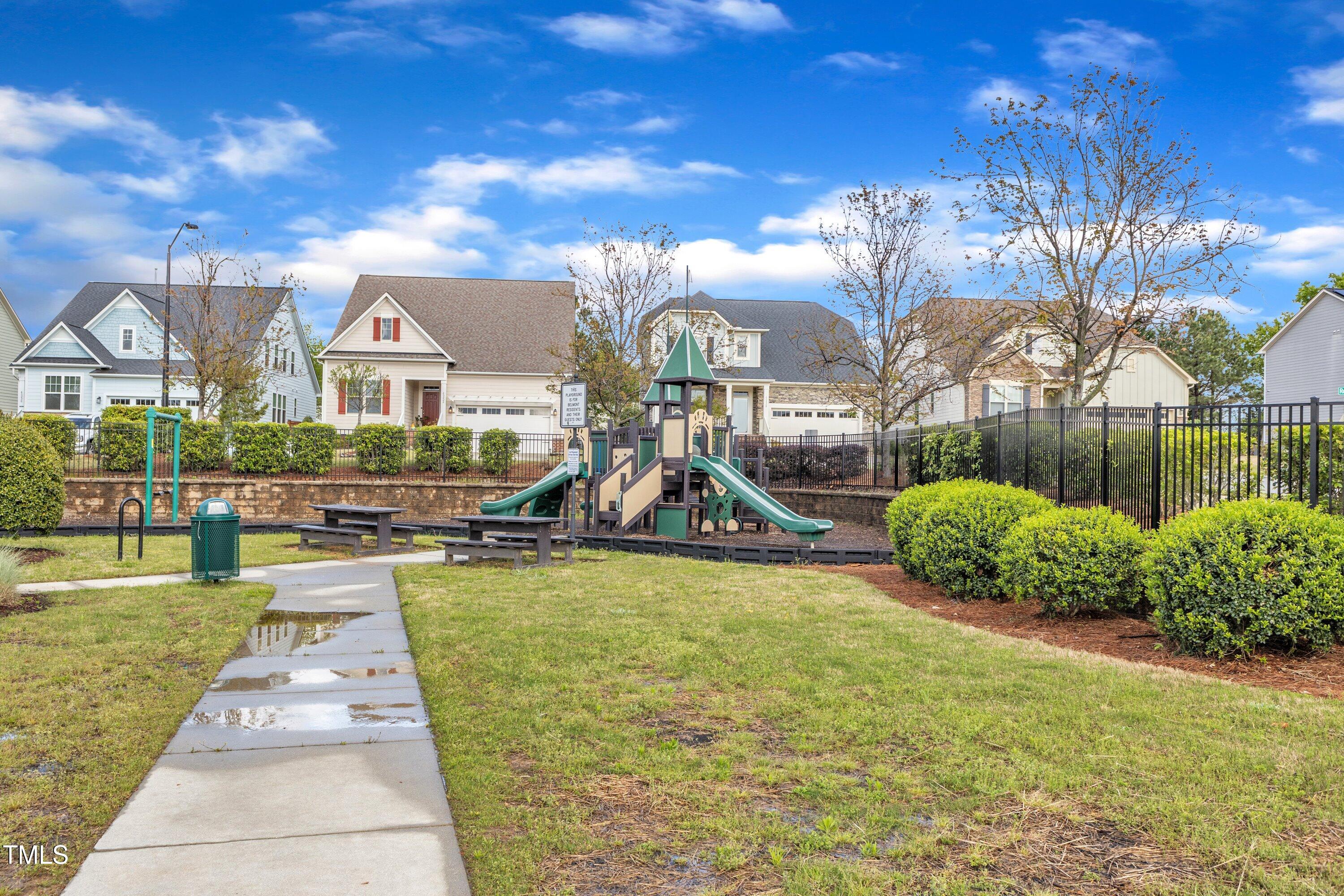 4252 Rockdell Hall Street Raleigh, NC 27616 - Photo 60 of 64 a view of a house with a swimming pool