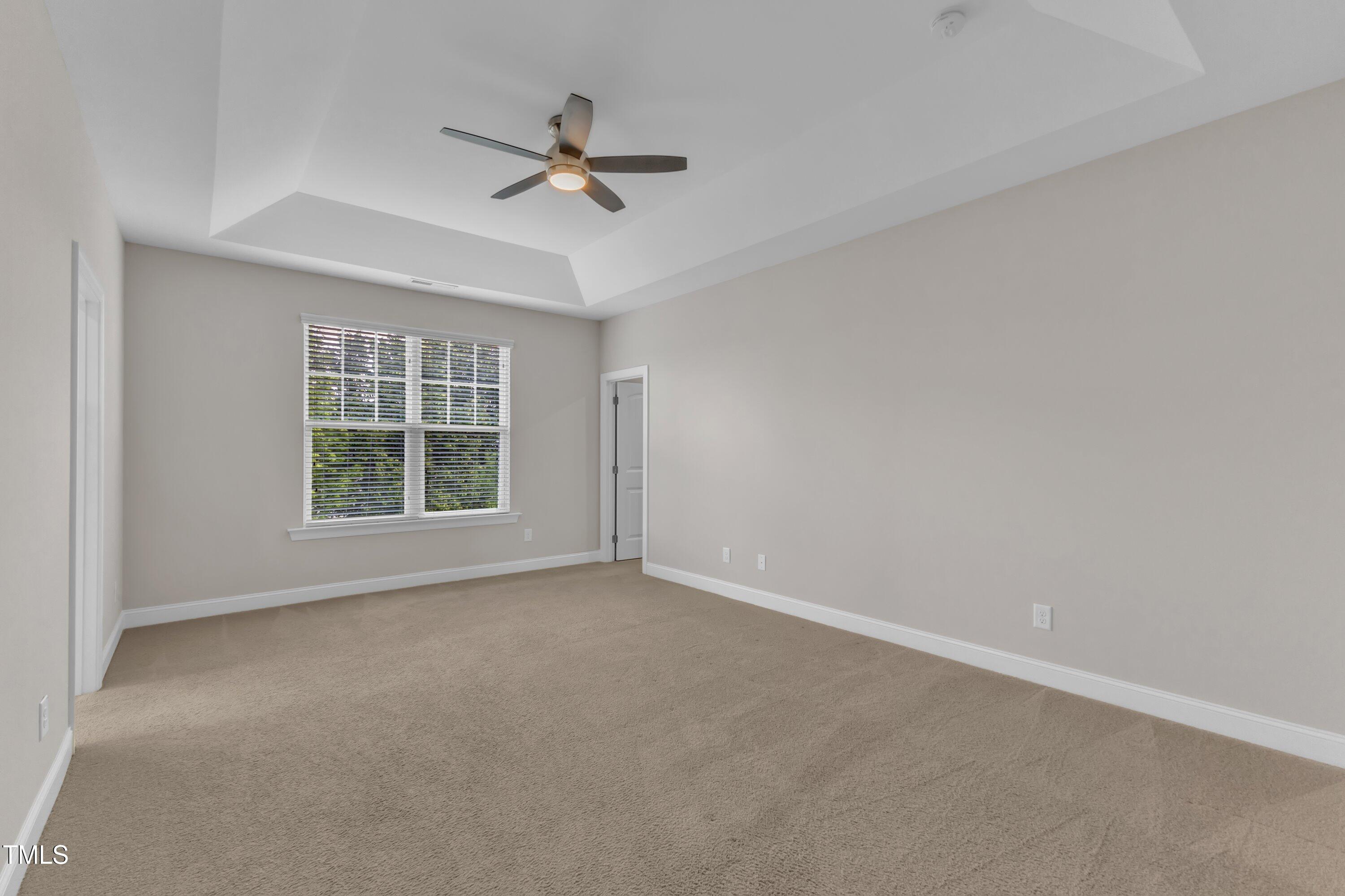 4252 Rockdell Hall Street Raleigh, NC 27616 - Photo 5 of 64 a view of a livingroom with a window