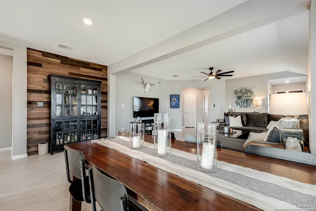 a view of a living room and dining room