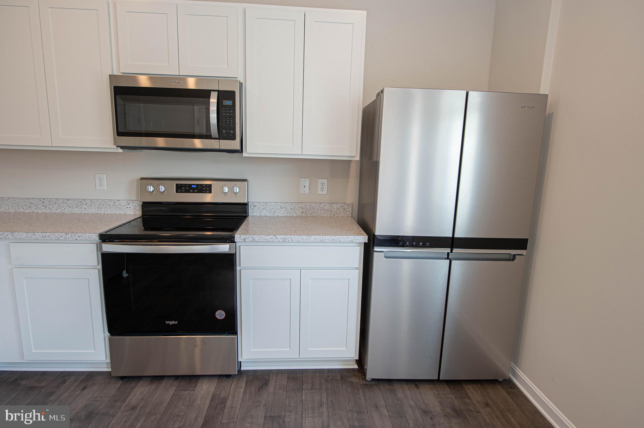 130 Willowtree Lane Fruitland, MD 21826 - Photo 27 of 74 a view of kitchen with stainless steel appliances and refrigerator