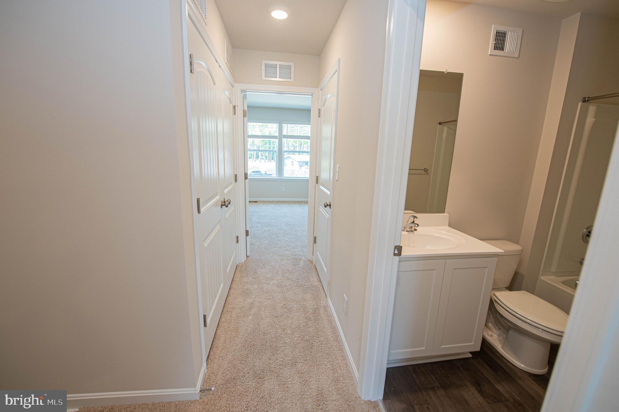 130 Willowtree Lane Fruitland, MD 21826 - Photo 44 of 74 a view of a bathroom with sink and mirror