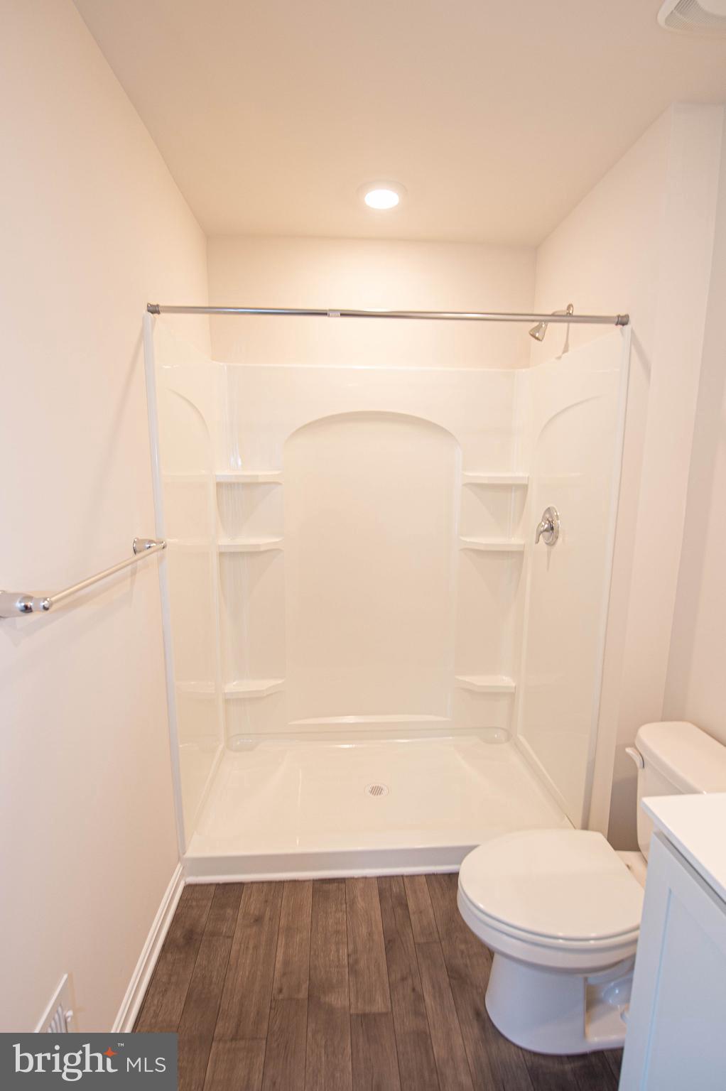 130 Willowtree Lane Fruitland, MD 21826 - Photo 53 of 74 a bathroom with a toilet and a shower