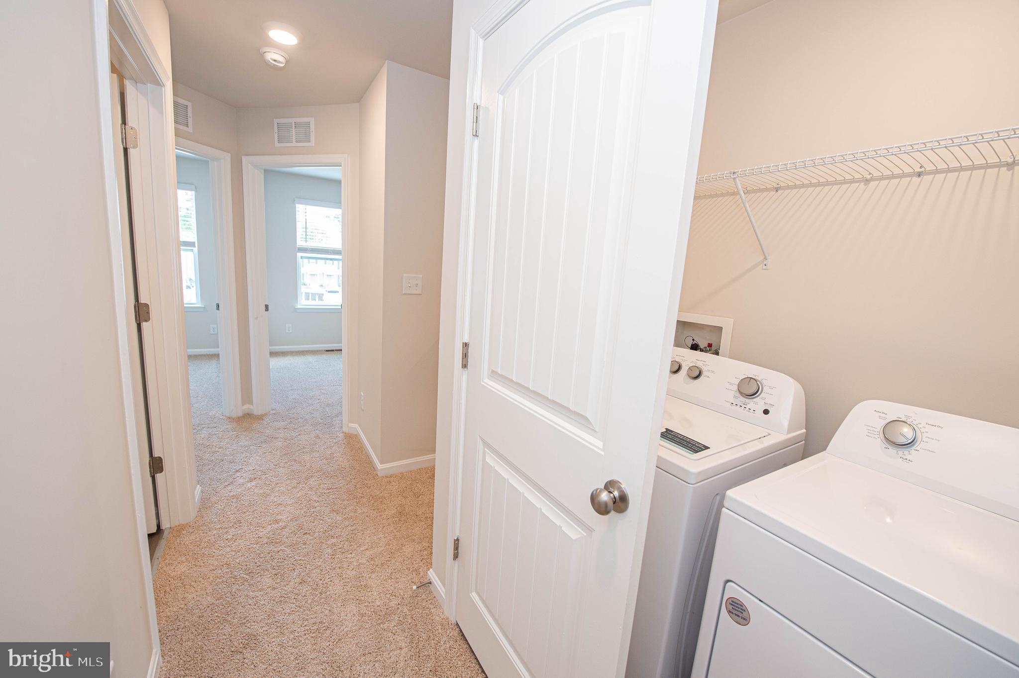 130 Willowtree Lane Fruitland, MD 21826 - Photo 59 of 74 a view of storage and utility room with utility room