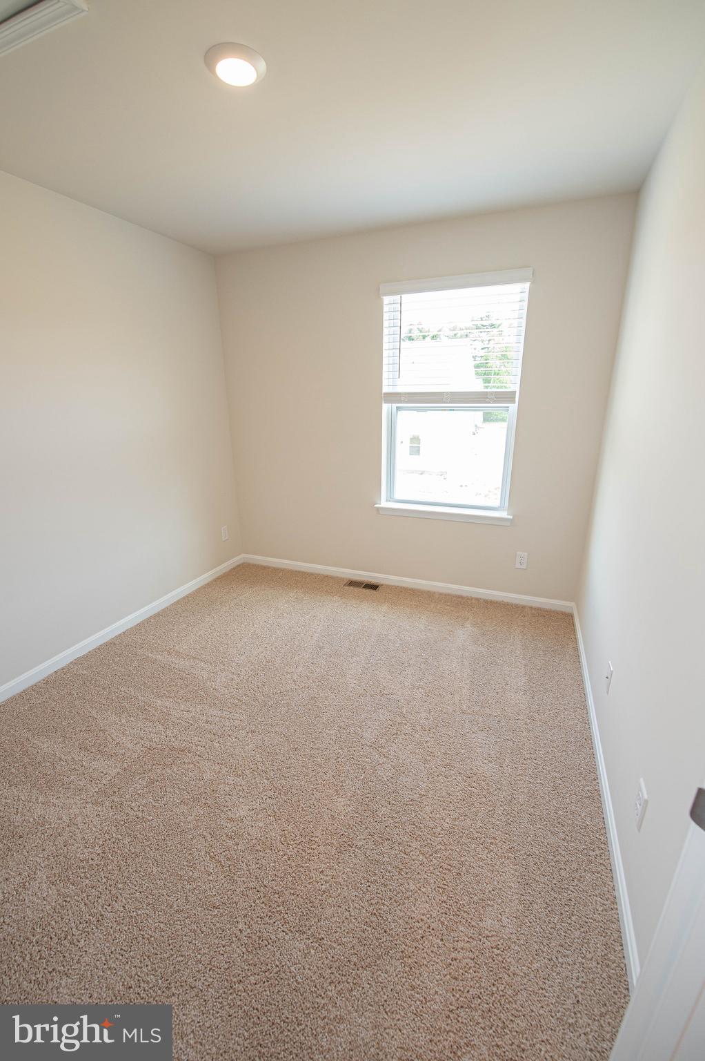130 Willowtree Lane Fruitland, MD 21826 - Photo 63 of 74 an empty room with a window