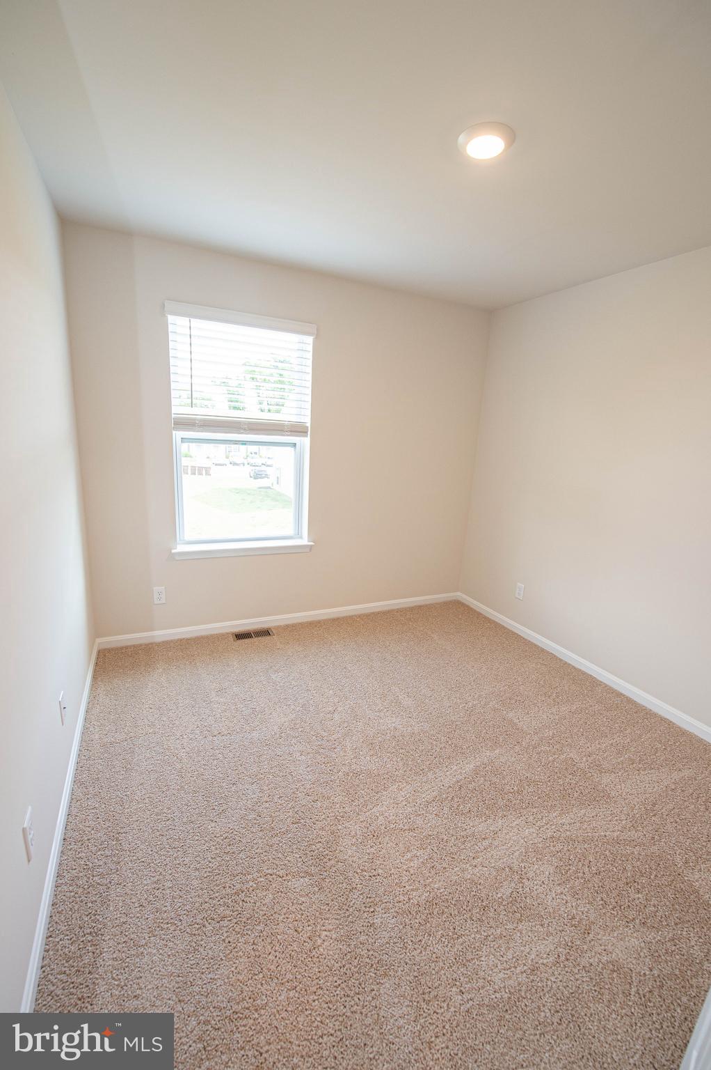 130 Willowtree Lane Fruitland, MD 21826 - Photo 67 of 74 an empty room with a window
