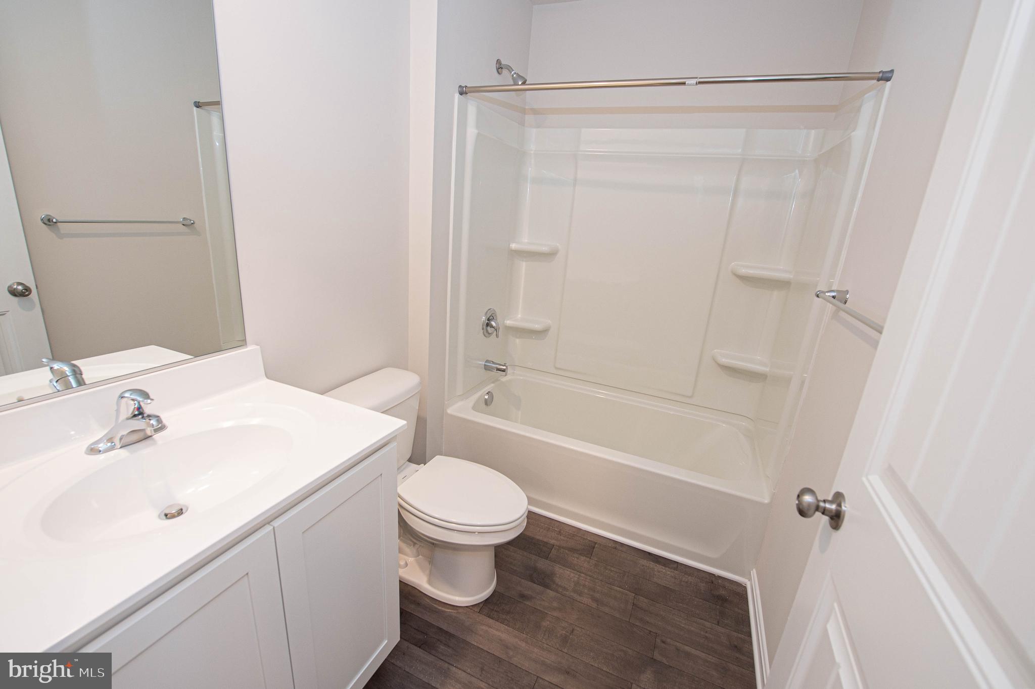 130 Willowtree Lane Fruitland, MD 21826 - Photo 70 of 74 a bathroom with a sink toilet and shower