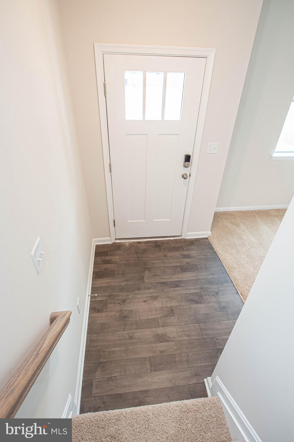 130 Willowtree Lane Fruitland, MD 21826 - Photo 74 of 74 an empty room with wooden floor and windows