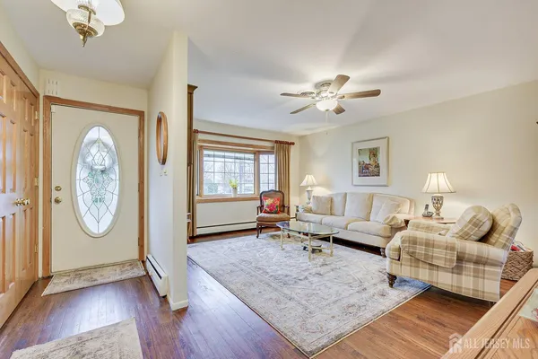 a living room with furniture and a window