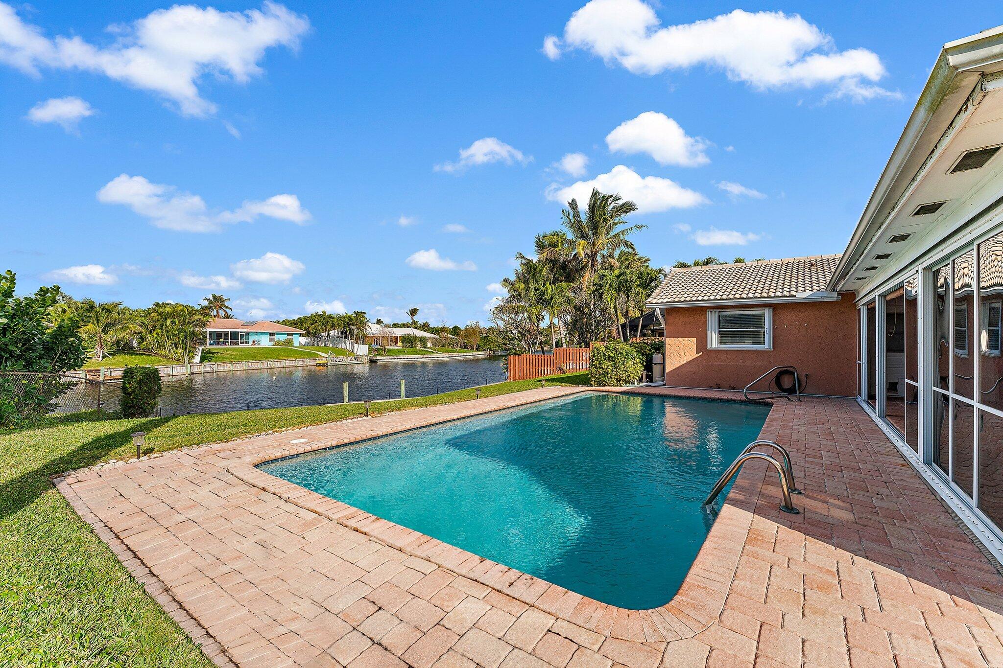 12867 Packwood Road North Palm Beach, FL 33408 - Photo 11 of 30 Pool & Lake View