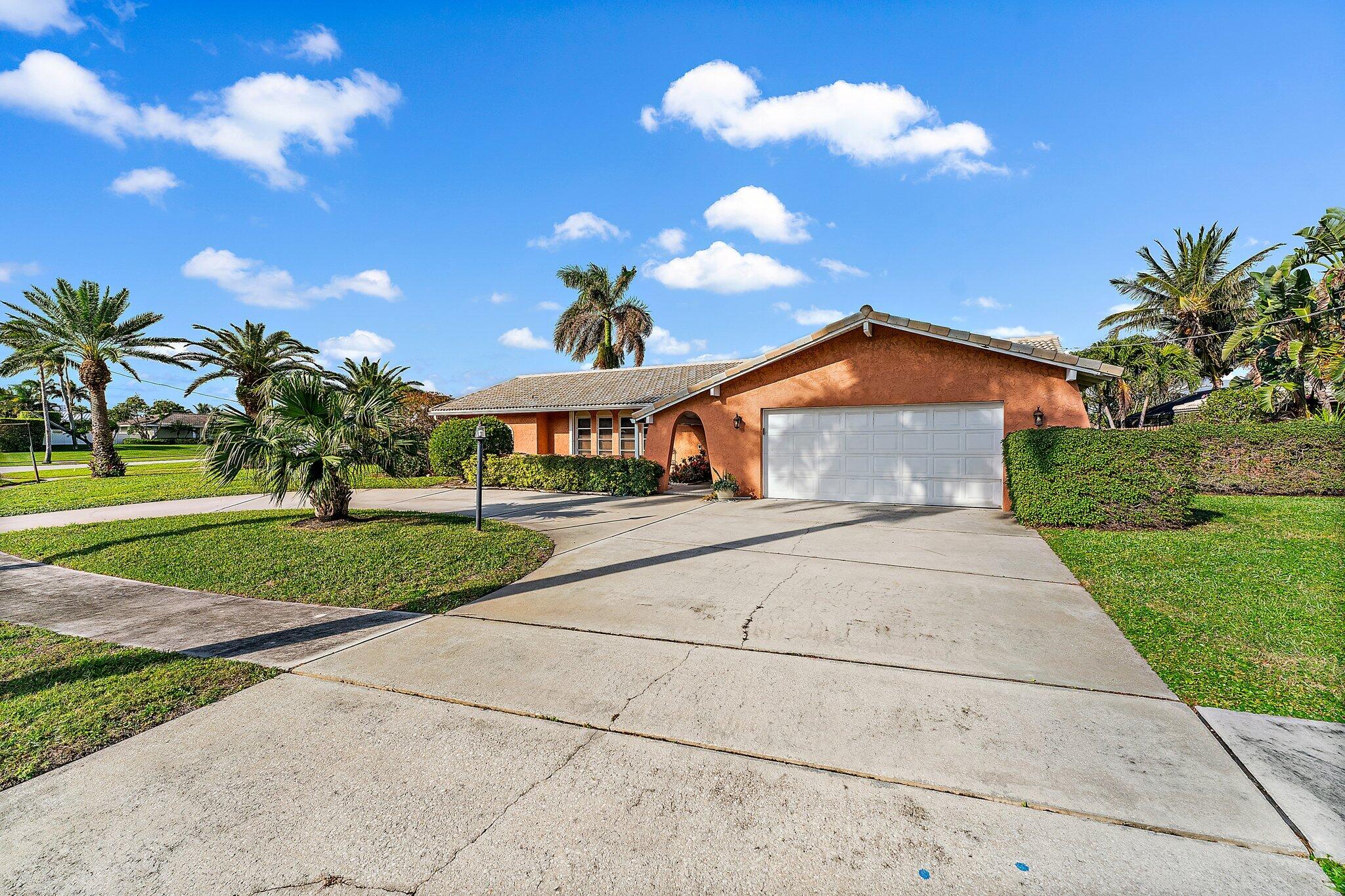 12867 Packwood Road North Palm Beach, FL 33408 - Photo 8 of 30 Front Exterior