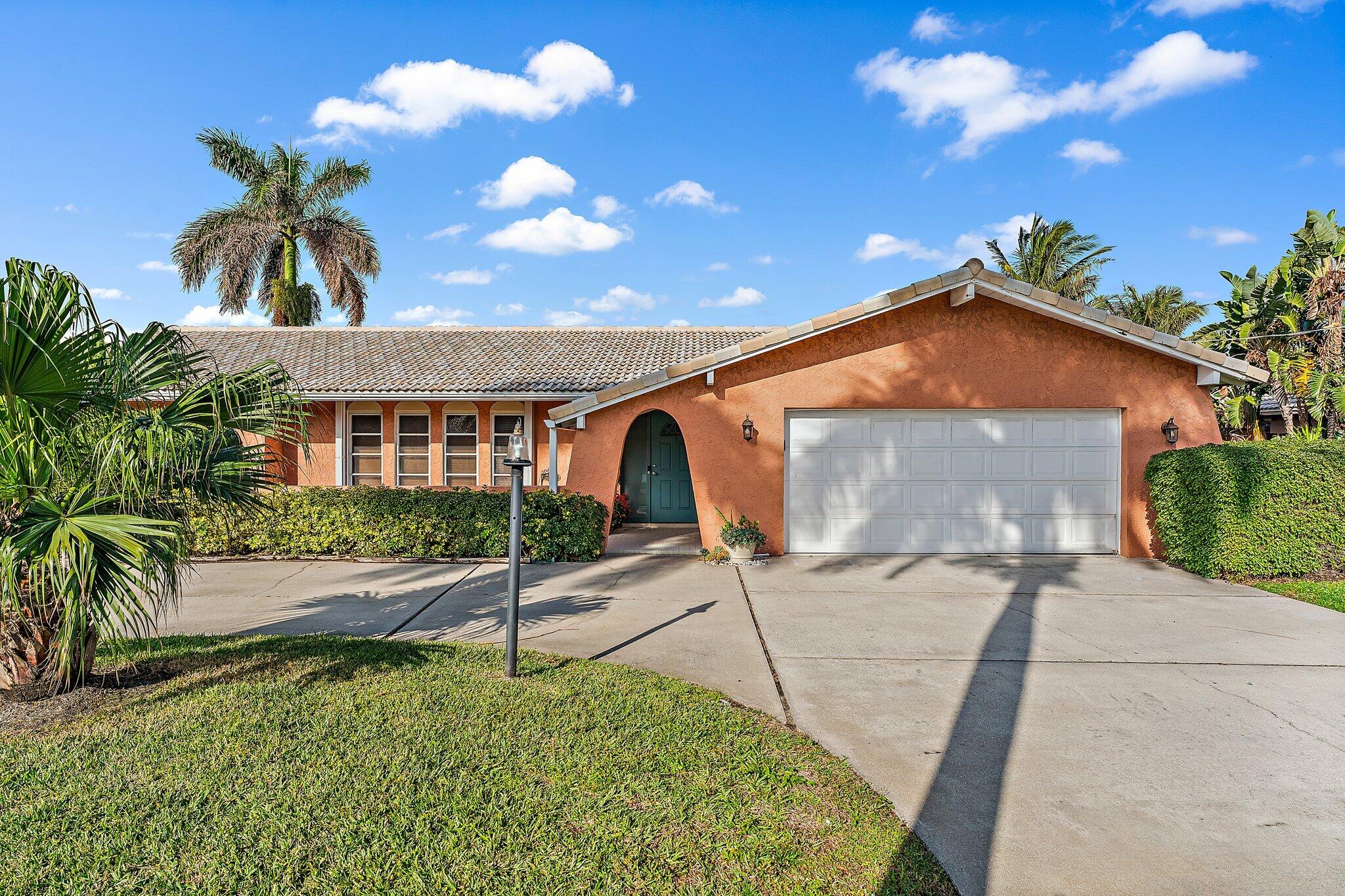 12867 Packwood Road North Palm Beach, FL 33408 - Photo 9 of 30 Front Exterior