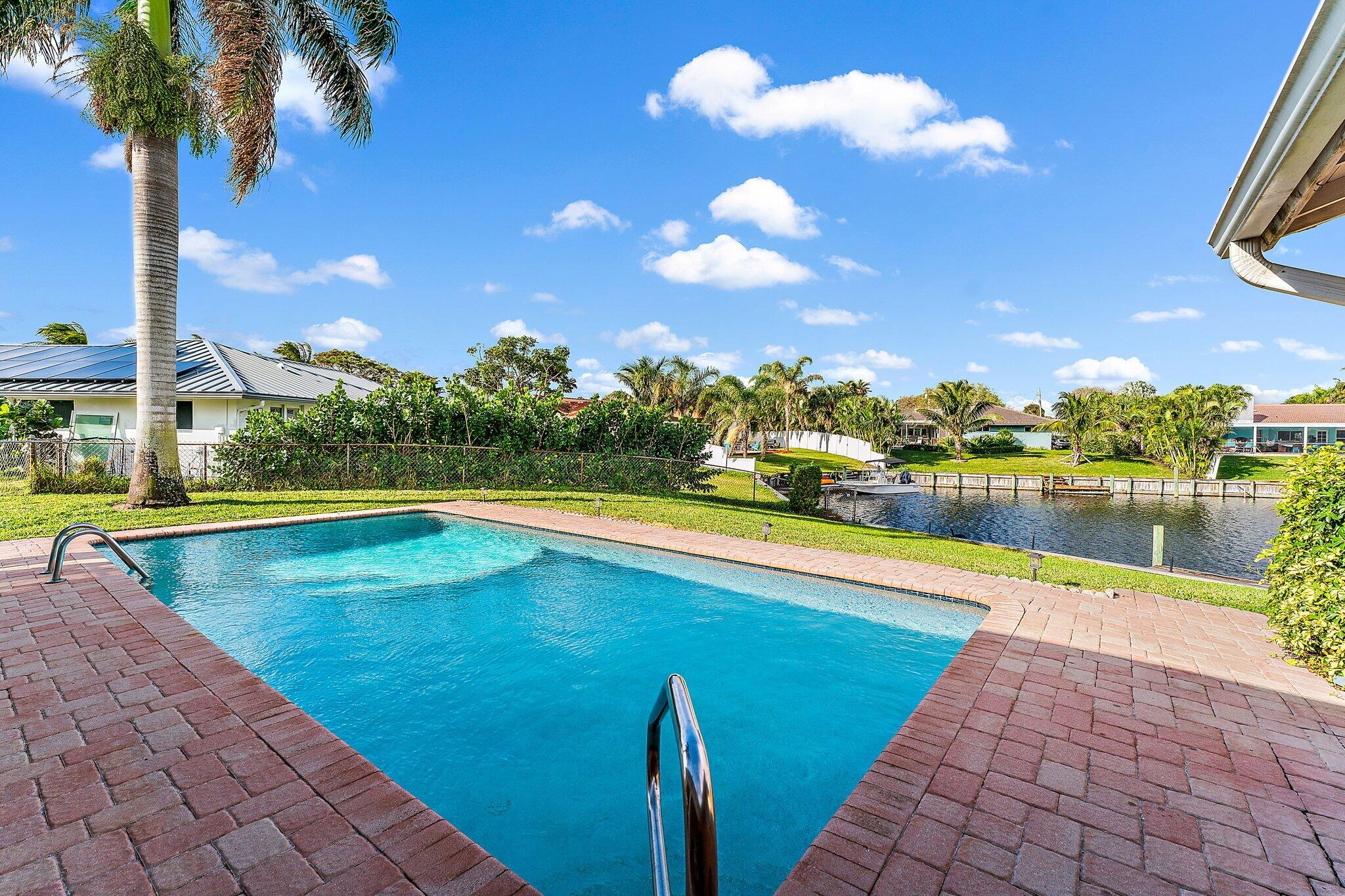 12867 Packwood Road North Palm Beach, FL 33408 - Photo 10 of 30 Pool & Lake View