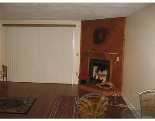 161 West Shore Road, Unit B8 Warwick, RI 02889 - Photo 3 of 16 Den/Family/Great Room. Living room fireplace w/deck.. Hardwoods