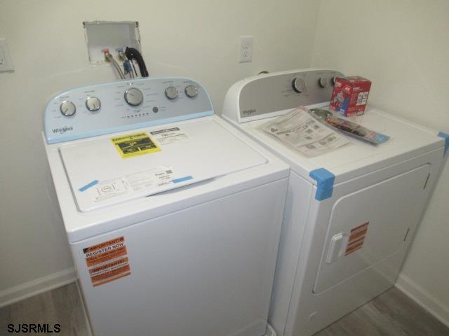 35 Apache Court, Unit 35 Galloway Township, NJ 08205 - Photo 6 of 10 a utility room with dryer and washer