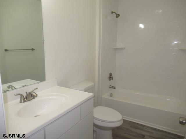 35 Apache Court, Unit 35 Galloway Township, NJ 08205 - Photo 8 of 10 a bathroom with a sink toilet and shower