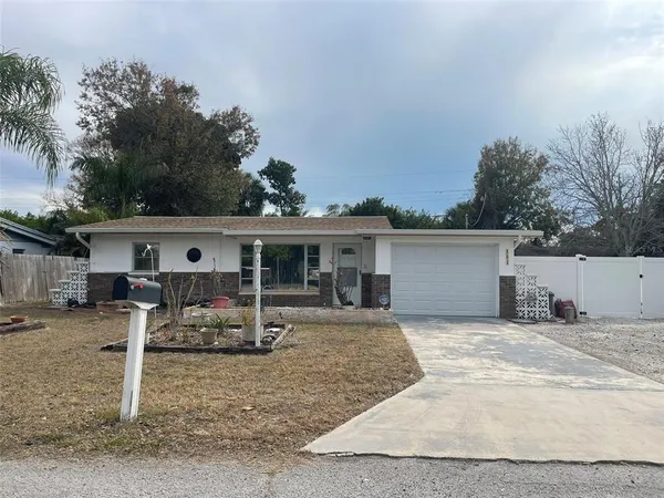 front view of a house with a patio