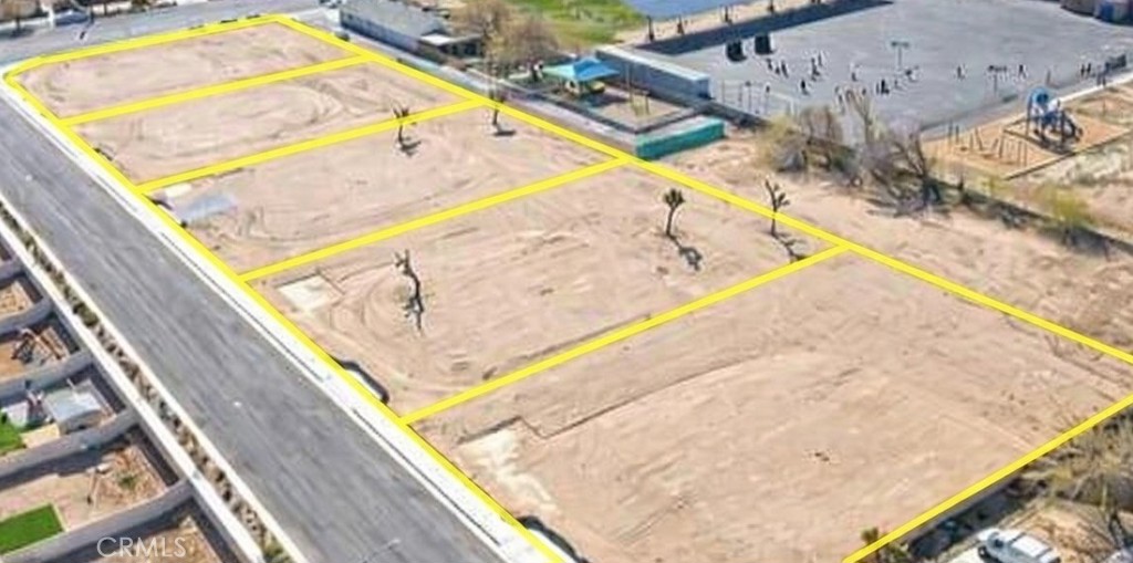 0 Valencia Street Hesperia, CA 92345 - Photo 2 of 3 a view of a swimming pool with an outdoor seating