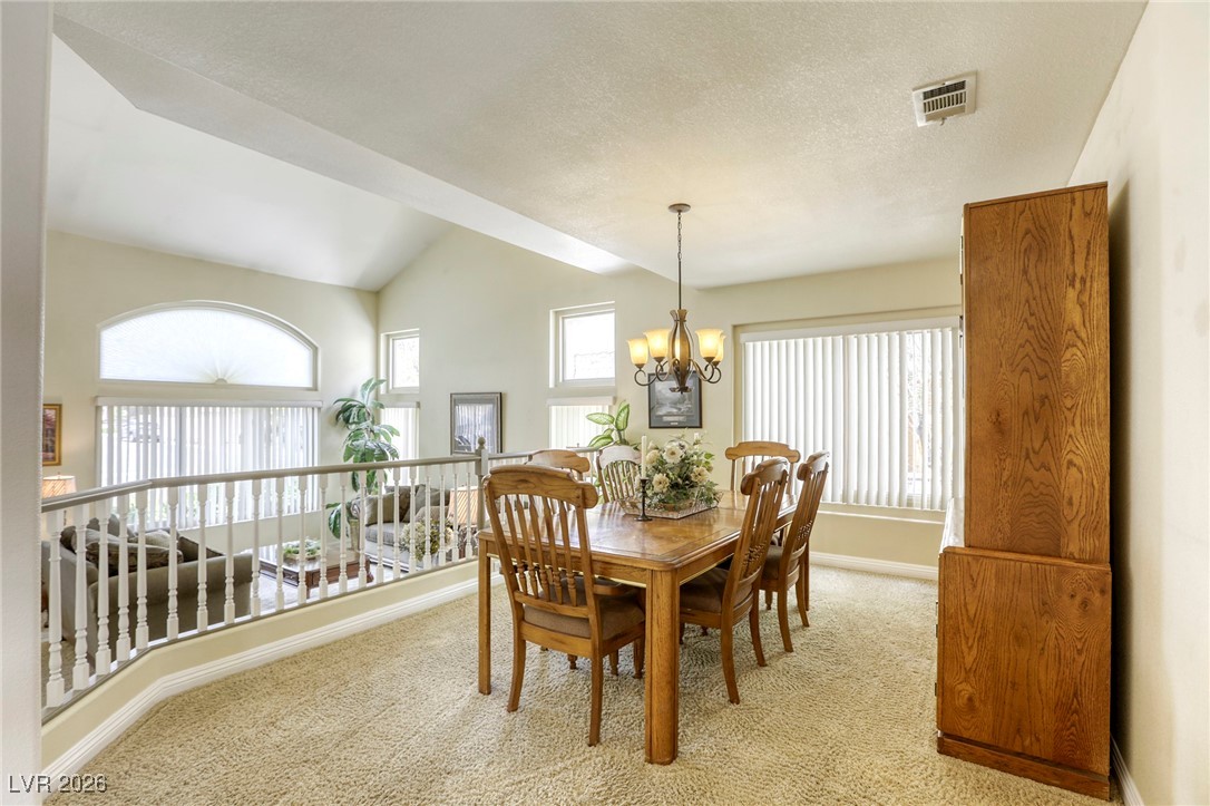 3692 River Canyon Road Las Vegas, NV 89129 - Photo 15 of 97 Your formal dining area, just around the corner from the kitchen.