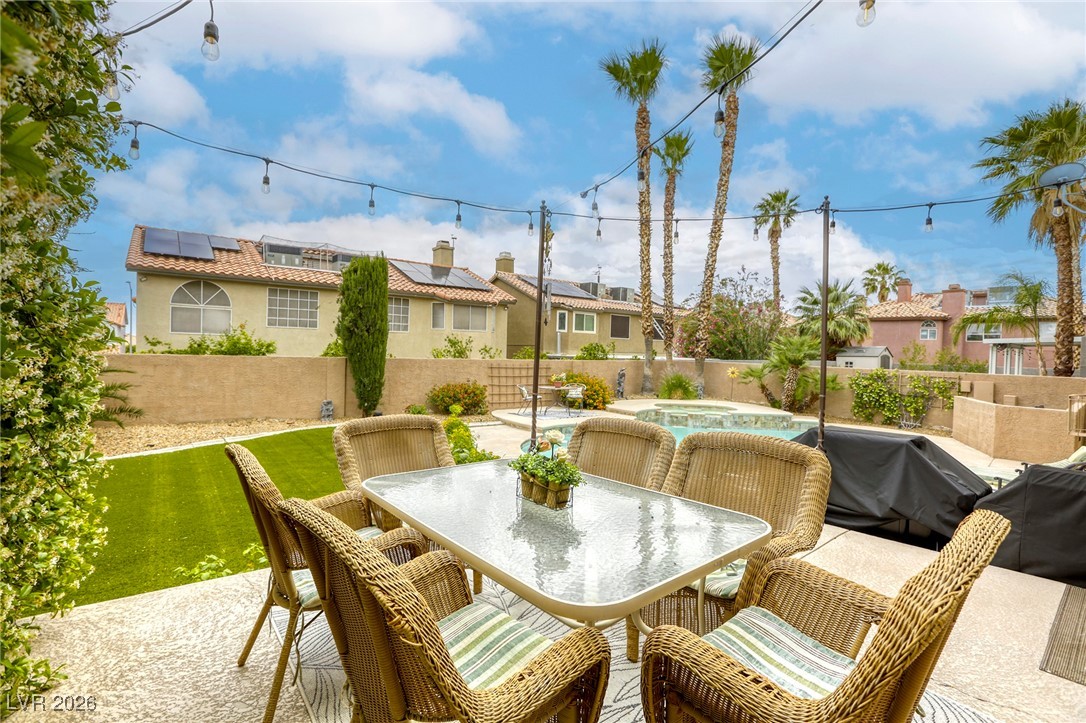 3692 River Canyon Road Las Vegas, NV 89129 - Photo 78 of 97 The raised patio makes for a great dining area!